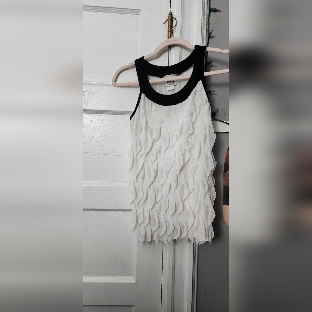 White ruffled top